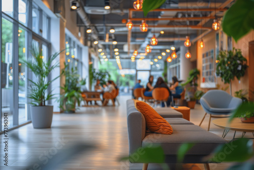 Modern office with business people in the office  blurred and bokeh background.