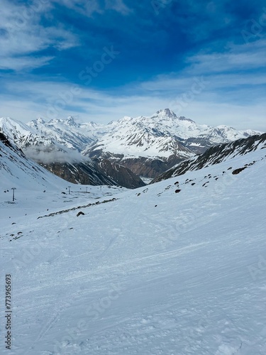 Aerial drone view of Gudauri ski resort in winter. Caucasus mountains in Georgia. Kudebi, Bidara, Sadzele, Kobi aerial panorama in caucasus winter mountains.