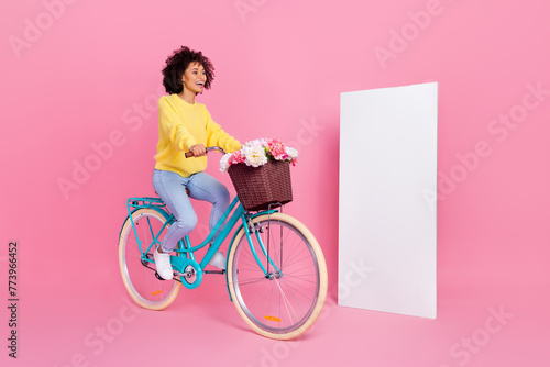 Fototapeta Naklejka Na Ścianę i Meble -  Full body profile side photo of young excited girl enjoy cycling vehicle weekend isolated over pink color background