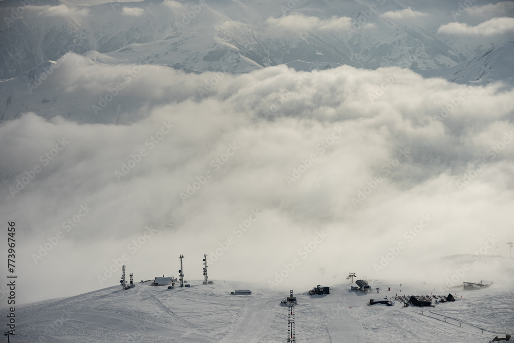 Aerial drone view of Gudauri ski resort in winter. Caucasus mountains in Georgia. Kudebi, Bidara, Sadzele, Kobi aerial panorama in caucasus winter mountains. Aerial drone view of Gudauri ski resort in winter. Caucasus mountains in Georgia. Kudebi, Bidara, Sadzele, Kobi aerial panorama in caucasus winter mountains.