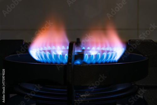 gas burning from a kitchen gas stove in dark © Freer