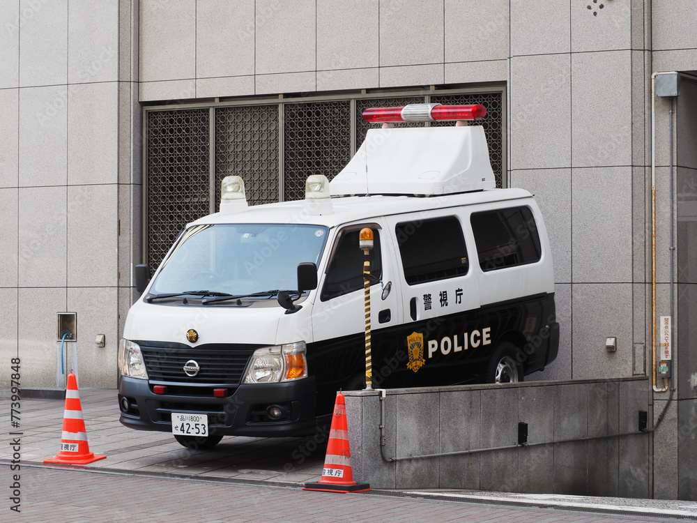 TOKYO, JAPAN - March 19, 2024: A police van parked outside a police ...