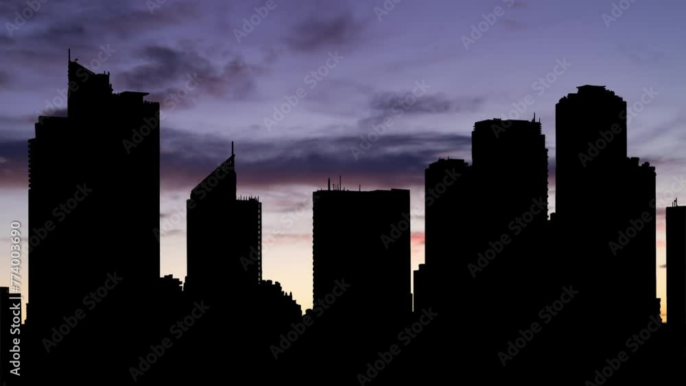 Manila: the capital of the Philippines, Time Lapse at Twilight with Colourful Sky and Dark Silhouette of Skyscrapers