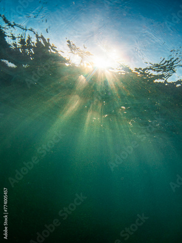 Beautiful sun rays pattern as seen underwater.
