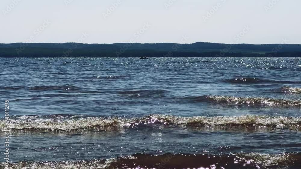 The Kama River is part of the Volga-Kama cascade of hydroelectric power plants, the largest left tributary of the Volga. Sandy riverbank with reeds, dried grass and pine forest The Kama River is part of the Volga-Kama cascade of hydroelectric power plants, the largest left tributary of the Volga. Sandy riverbank with reeds, dried grass and pine forest