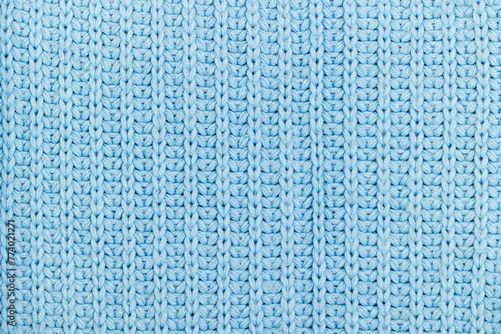 Blue knitted texture with loops Blue knitted texture with loops