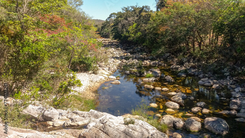 Small waterfall with a big pool . It is located in São José da serra next to  Serra do Cipó region in Minas Gerais, Brazil © Natael