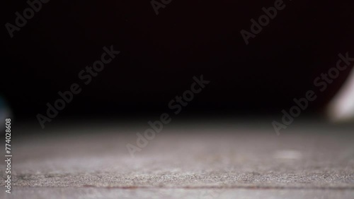 Tight shot of carpet being placed