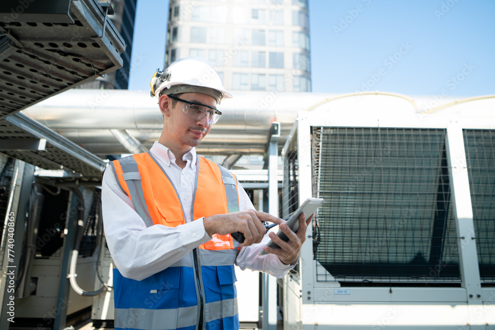 Engineers inspect the completed air conditioning and water systems to continue verifying their functionality. Engineers inspect the completed air conditioning and water systems to continue verifying their functionality.