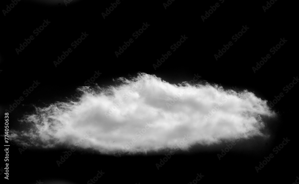 The contrast of the white cloud against the black background creates a ...