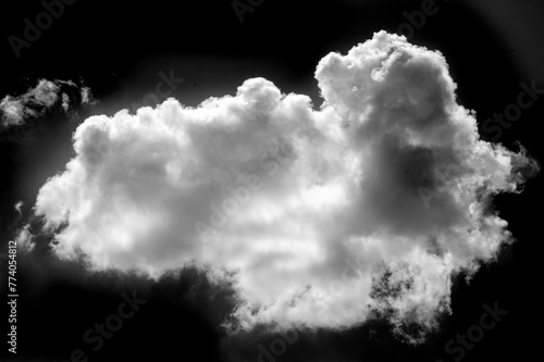 White cloud on a black background. Stunning visual contrast with white cloud on black background. Unique and attractive design. Creates a feeling of calm and tranquility.