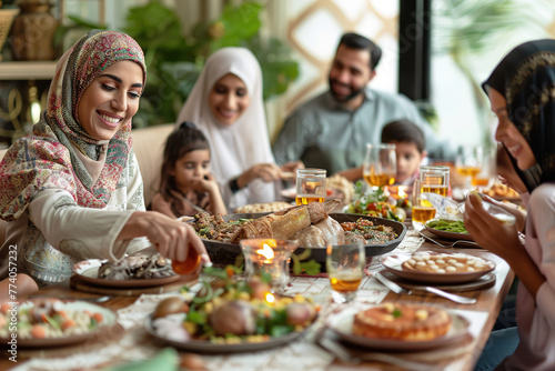 Muslim family enjoying Iftar meal together during Ramadan