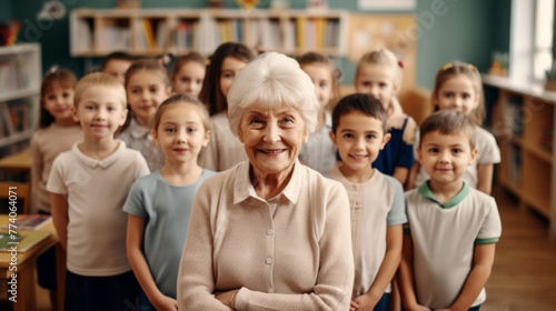 The woman is smiling and posing for a picture with the children