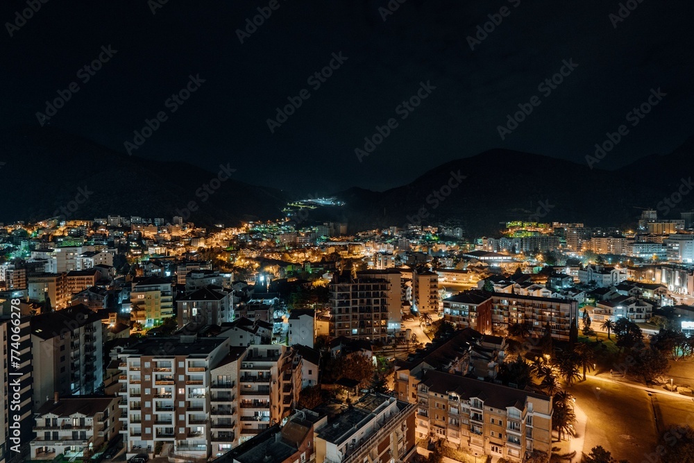 Aerial view of the cityscape of Budva at night, Montenegro