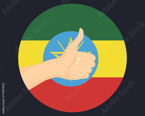 Hand approve sign with Ethiopia flag, thumb up, approval or vote concept