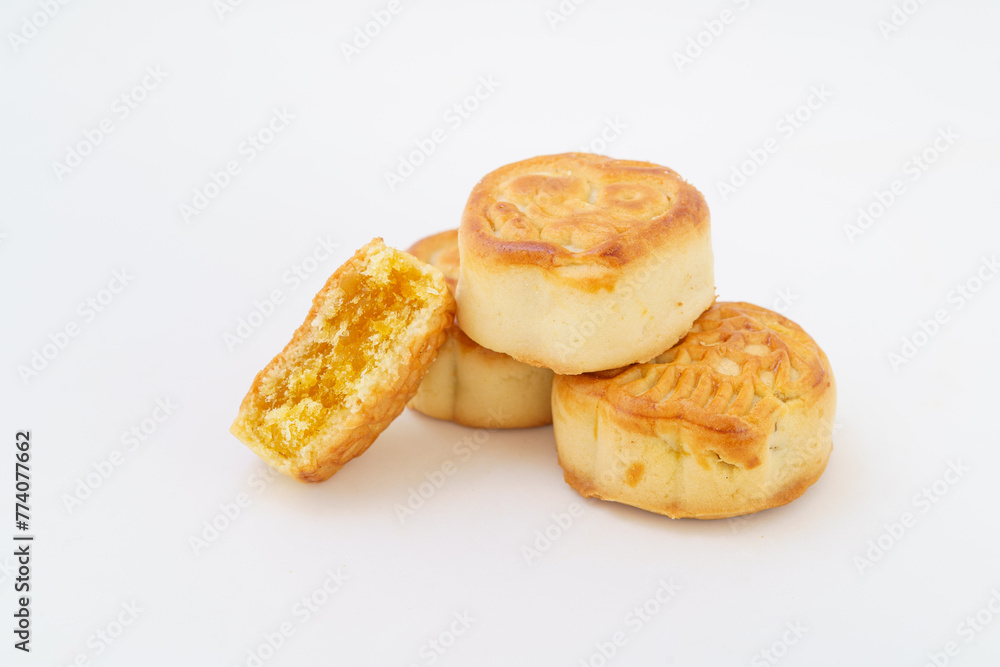 Multiple small mooncakes on white background Multiple small mooncakes on white background