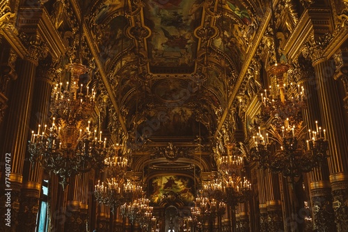Low-angle of Palais Garnier luxury chandeliers, Paris, France photo