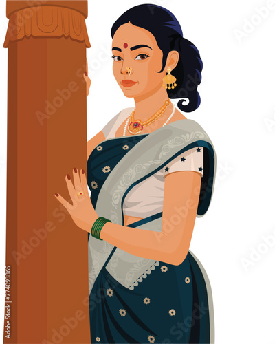 Indian Women In Saree Standing Near a Pillar