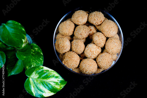 close up view of a beautiful chestnut cake on a black background. photo