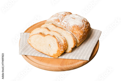 Assortment of freshly sliced baked bread with napkin isolated on white background. Healthy unleavened bread. French bread slice