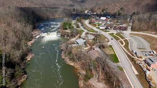 Ohiopyle state park beside Youghiogheny River and Ohiopyle State Park with whitewater rapids waterfall visitor center and park with tourist photo