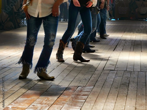 Closeup shot of the legs of traditional western folk dancing under the music