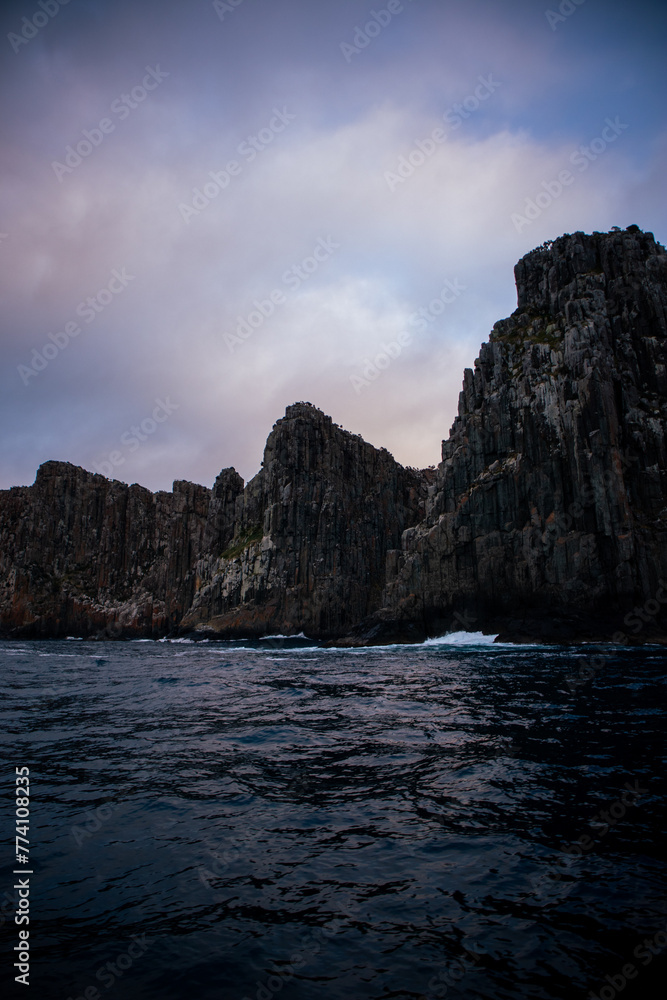 View of the rocky cliffs at sunrise in Cape Hauy Tasmania