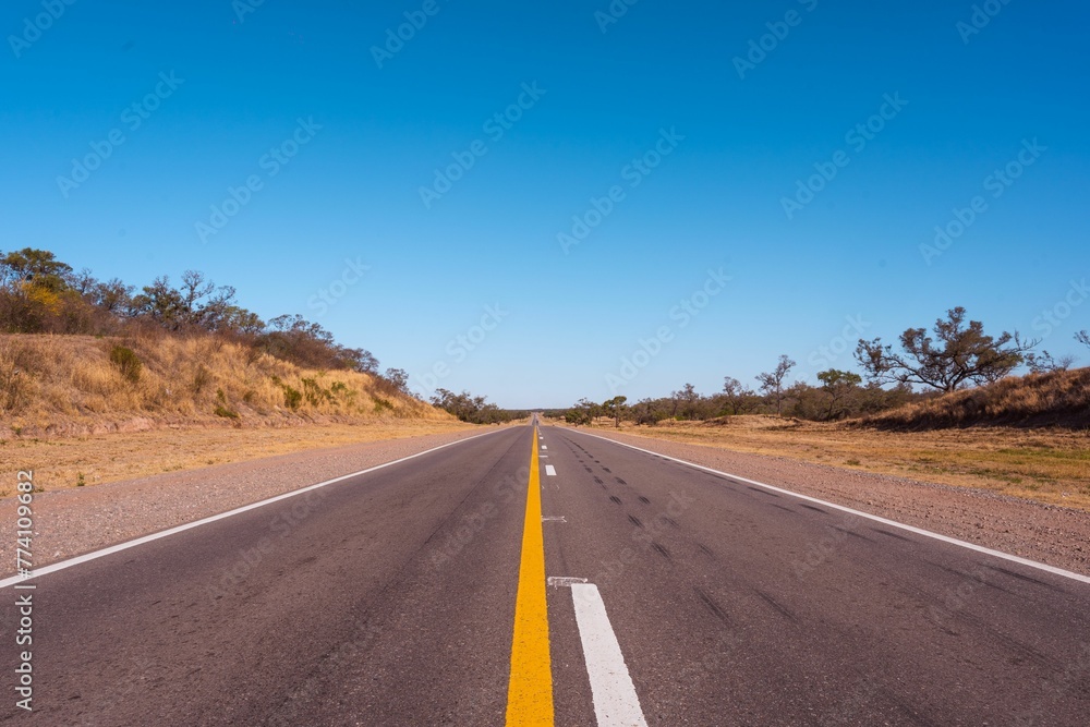 Empty highway leading to the Santiago del Estero, Argentina Empty highway leading to the Santiago del Estero, Argentina