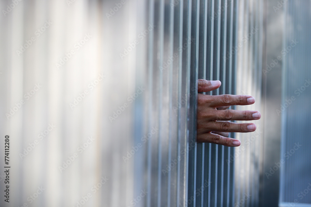 Obraz premium hands in jail