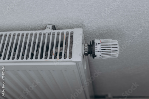 Radiator in the apartment. Saving heating