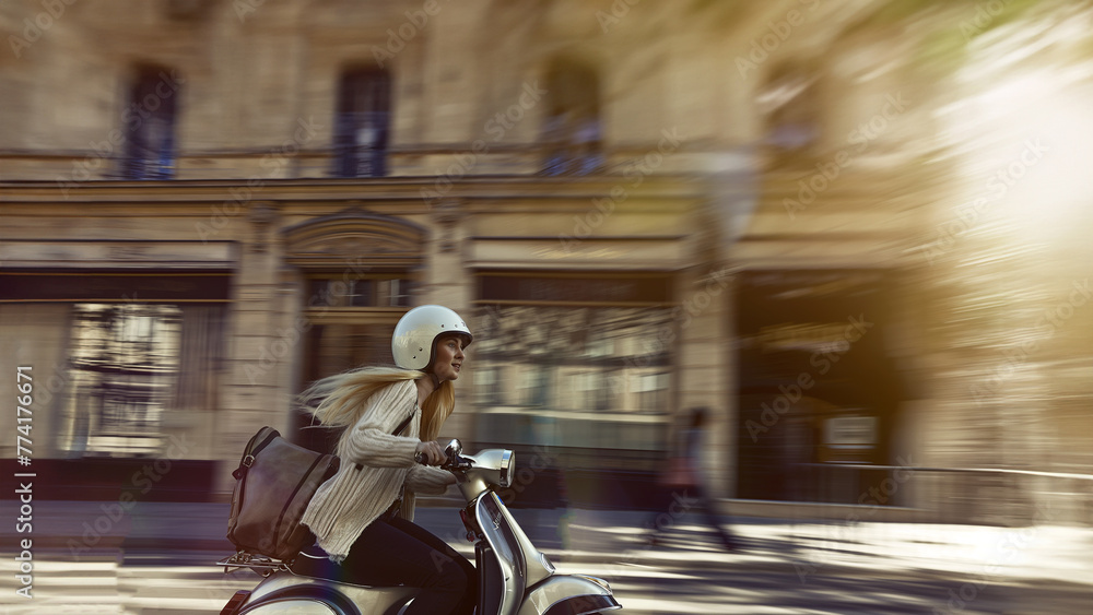 Obraz premium Scooter ride in the city.