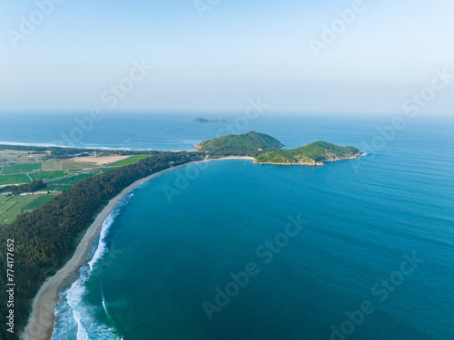 Aerial photography of the summer coastline of Dahuajiao, Wanning, Hainan, China