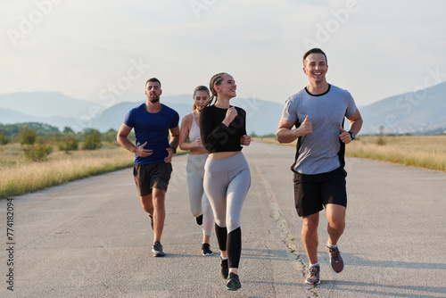 A group of friends maintains a healthy lifestyle by running outdoors on a sunny day, bonding over fitness and enjoying the energizing effects of exercise and nature