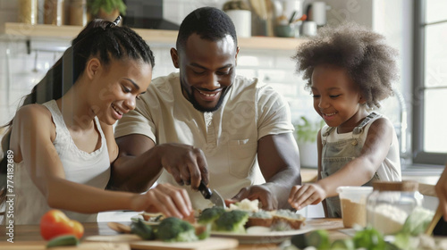 African american family in kitchen smile   preparing luch happines cooking food together