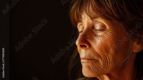 Serene senior woman with facial serum her face glowing with stories and the beauty of aging gracefully