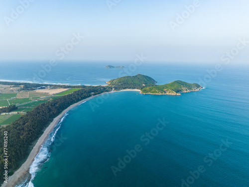 Aerial photography of the summer coastline of Dahuajiao, Wanning, Hainan, China © hu