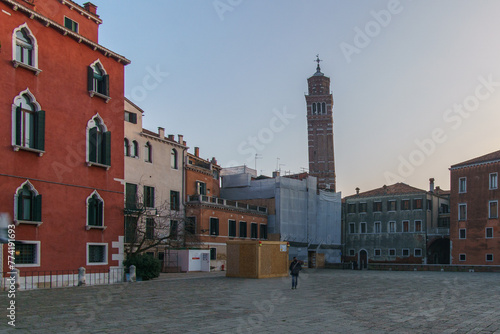 Campo San Anzolo square and the bell tower of the Stanto Stefano Church on a sunny winter evening, Venice, Veneto, Italy photo