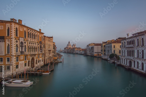 Long Exposure view of Grand Canal and Basilica Santa Maria della Salute seen from the Rialto Bridge on a hazy winter evening, Venice, Veneto, Italy