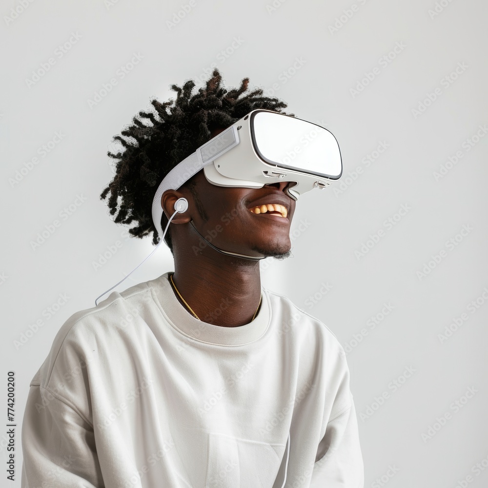 A happy young man wearing virtual reality glasses. A happy young man wearing virtual reality glasses.