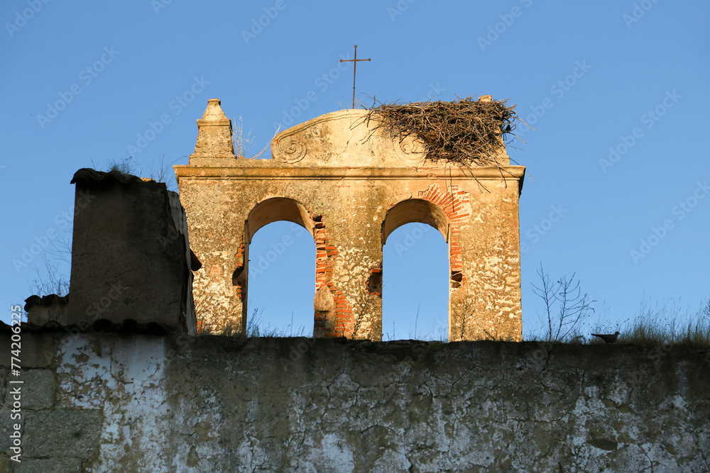 Stork nest on remains of antique church in Merida - obrazy, fototapety, plakaty 