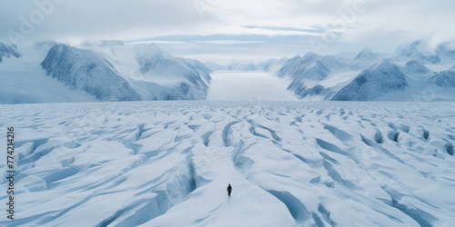 Amidst the frozen stillness of a lake, a person strides confidently, their steps echoing in the crisp winter air.