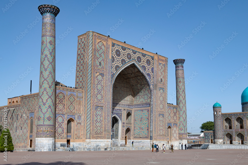 Medieval Ulugbek madrasah on Registan Square on a sunny September day, Samarkand
