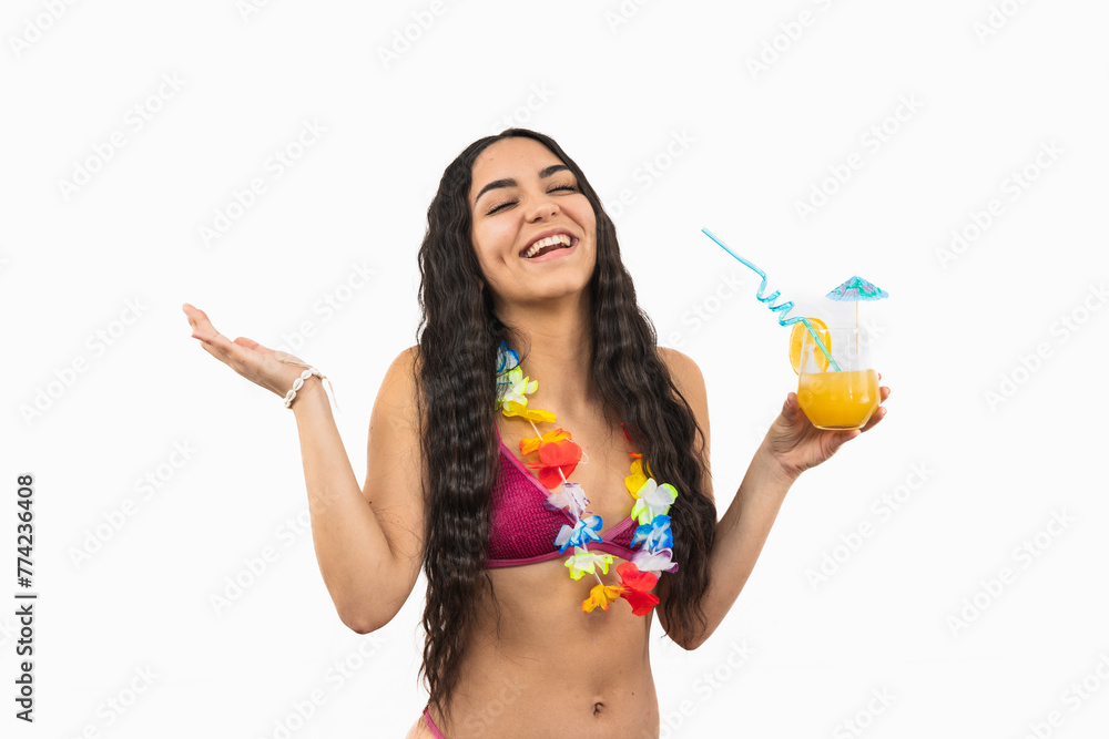 Happy young Latin girl in bikini laughing cheerfully while holding a cocktail on white background Happy young Latin girl in bikini laughing cheerfully while holding a cocktail on white background