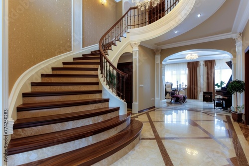 Interior design of modern entrance hall with staircase in villa