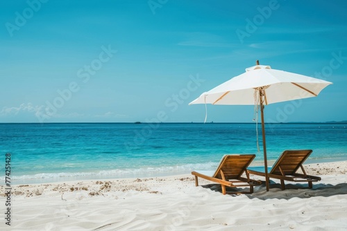 lounge chairs on the beach, beach chair and umbrella