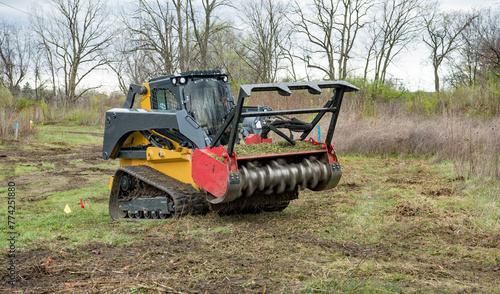 Forestry Mulcher in Action Mulching Field Weeds