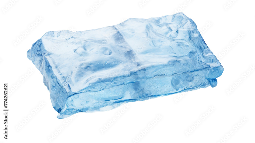 A piece of ice delicately balances on a white background A piece of ice delicately balances on a white background