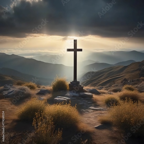 There is a large cross on the hill in the sunlight