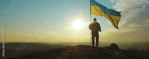 Ukrainian flag waving, defiant against war's shadow photo