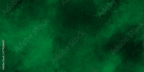 Old and grainy Grunge green background, Dark green Smoke Abstract Background, Brush stroked painting green Watercolor paper texture, Abstract painting by green watercolor ink texture. 